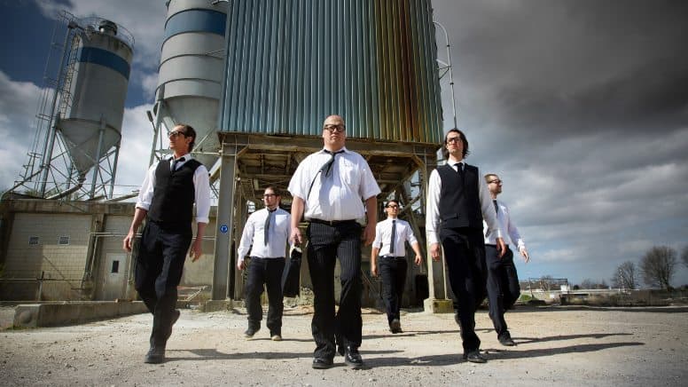 Une équipe d'auditeurs qui viennent pour un audit de surveillance ISO 9001